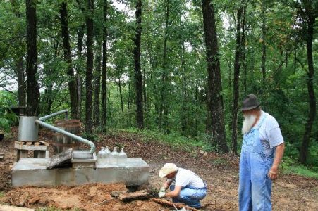 Moonshine still raided at Coondog Cemetery 75th anniversary celebration Image